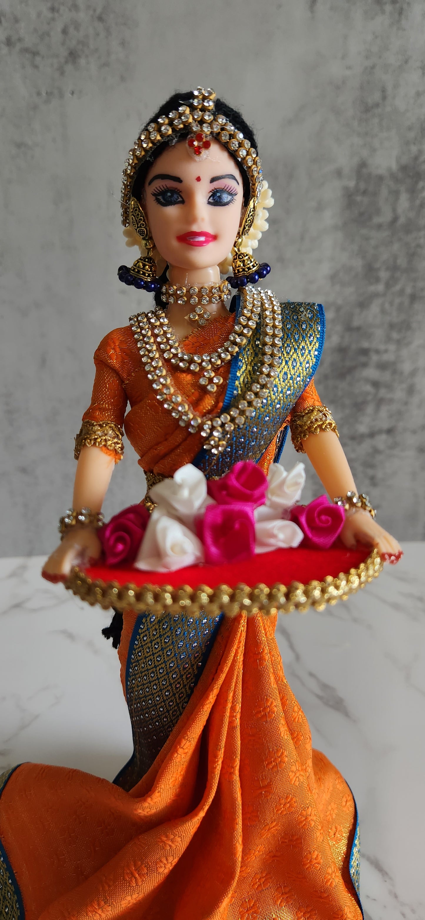 Indian Ethnic Doll holding Flowers Tray